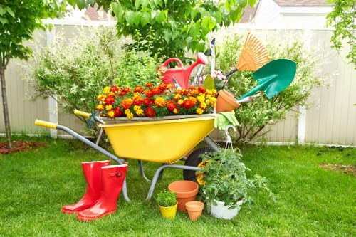 Landscaping team preparing a garden service booking agreement